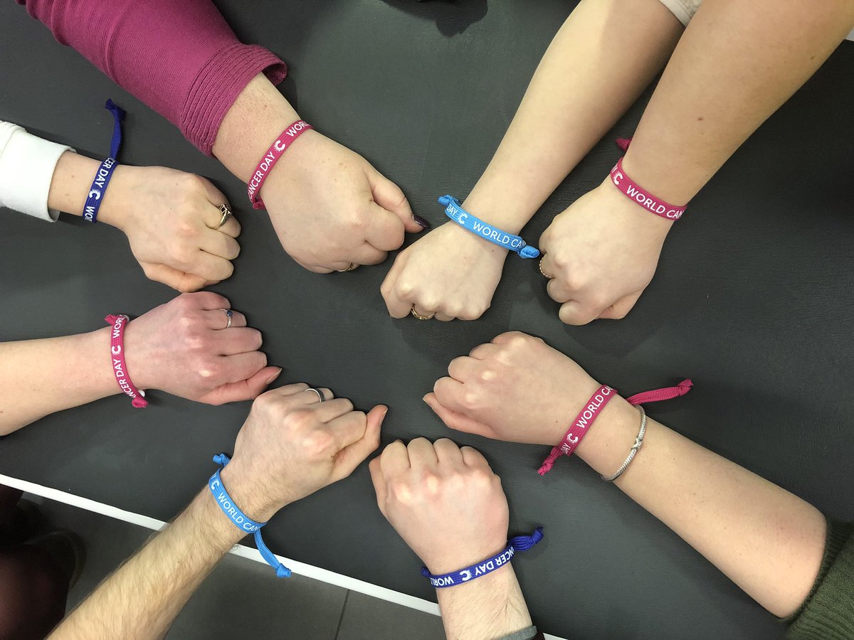 MCRC operations team wearing unity bands this world cancer day
