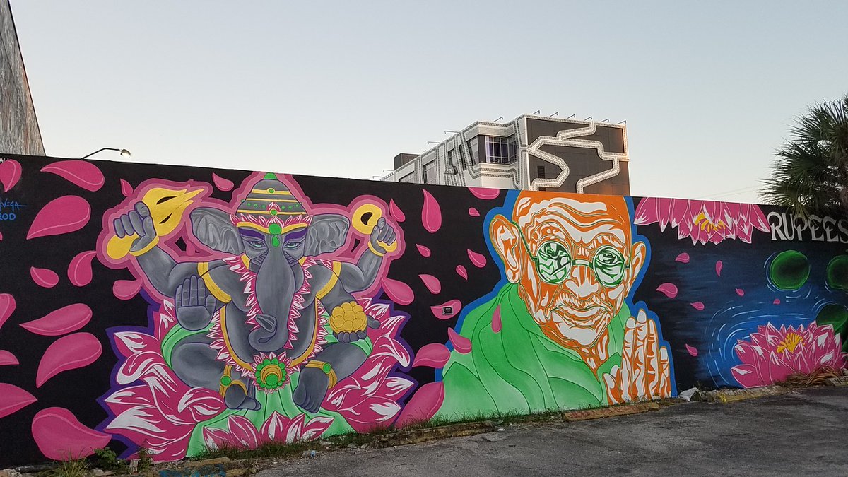 WynwoodMiami's tweet photo. Have you spotted this beautiful mural at Rupees ๐ 415 NW 27th Street? It is the only mural in Wynwood of Gandhi and Ganesh (Hindu god known as remover of obstacles). ๐จRoderick Mendoza @krtvrod & Marvin Vega @art_mvega. #BollywoodInWynwood #RupeesInc #RupeesWall https://t.co/Ko4gDQh9OS