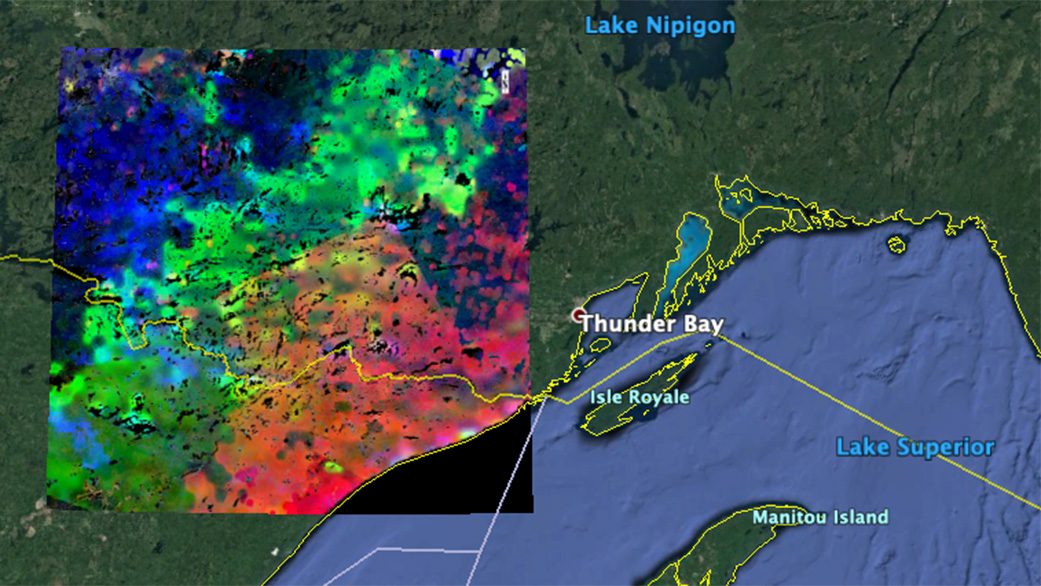 The image shows plants "waking up" near Lake Superior. Red areas began to wake up at around 7 a.m. local time; green areas awoke around 8 a.m.; and blue areas, at about 9 a.m. The data was acquired by ECOSTRESS during the summer season. Credit: NASA / JPL-Caltech