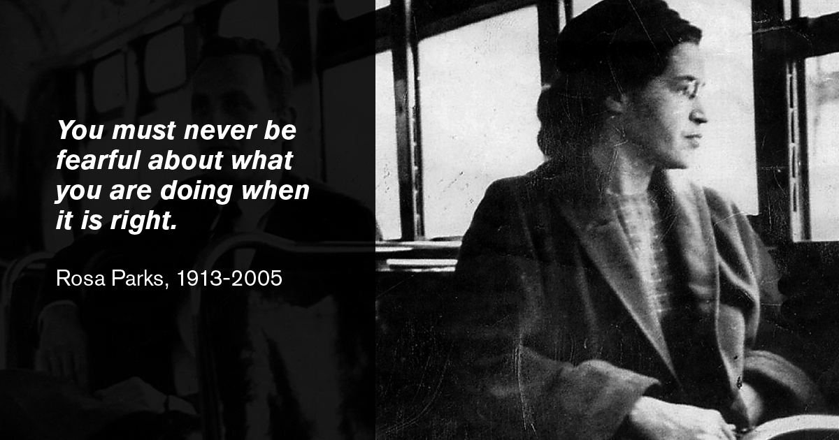 Civil rights leader Rosa Parks looking out the window while riding a bus. 