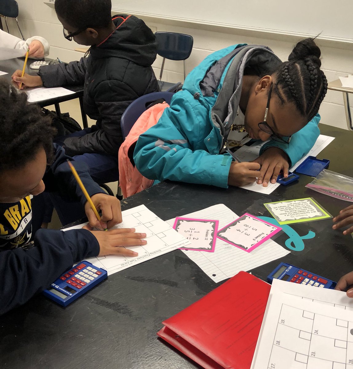 Terry7thMath's tweet photo. Working hard with Math Task Cards this morning. Moving around while working and learning. Happy Tuesday 😊 #placetOBe #OBMSpride https://t.co/Jf2ZGQOOak