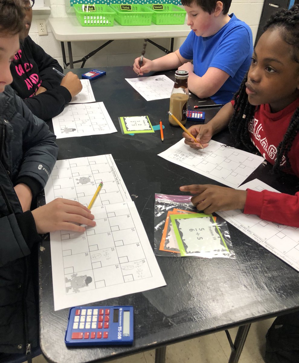 Terry7thMath's tweet photo. Working hard with Math Task Cards this morning. Moving around while working and learning. Happy Tuesday 😊 #placetOBe #OBMSpride https://t.co/Jf2ZGQOOak