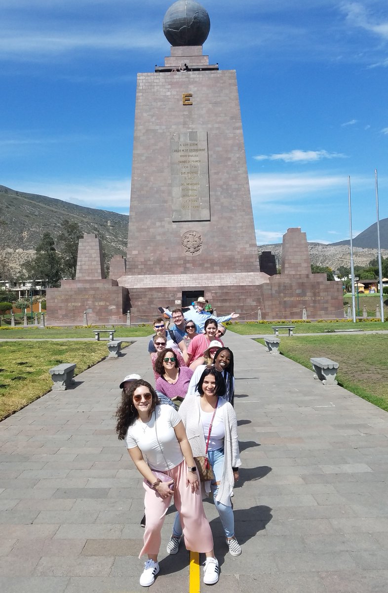 MSMU's tweet photo. Our students studying in Ecuador this semester straddling the equator at Mitad del Mundo with one foot in the north and the other in the south and at the entrance of the Intiñan interactive museum. #studyabroad #exploreboundlessly https://t.co/HKl2gybEZK
