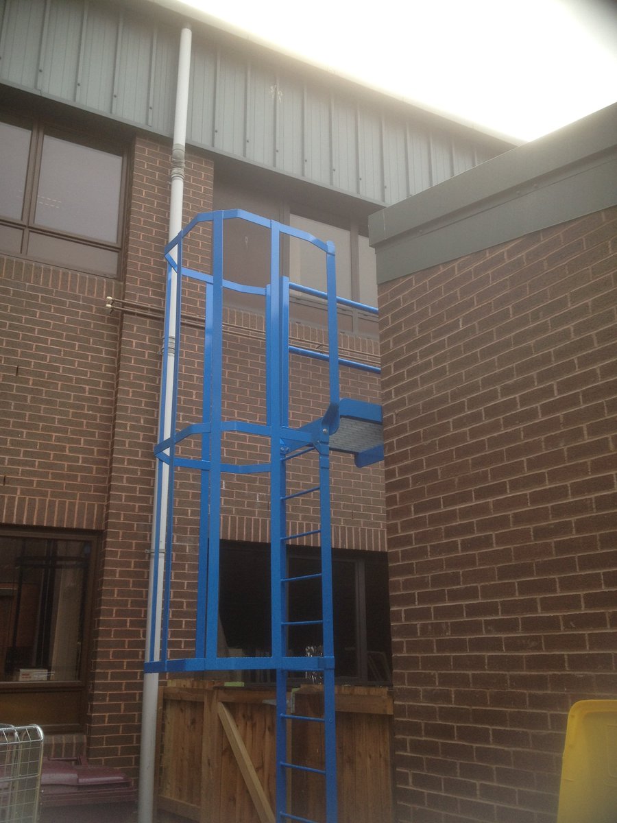 polyester powder coated mild steel cat ladder with access platform installed at gloucester hospital #welding #fabrication #steel