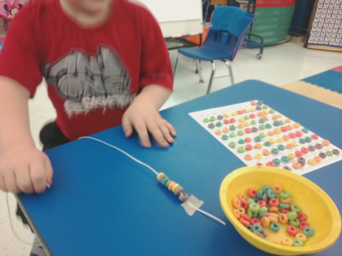 wwpskremillard's tweet photo. 100th Day celebrations @WakefieldHills.  Fun with Fruit Loops! https://t.co/l0VqqSeW7O