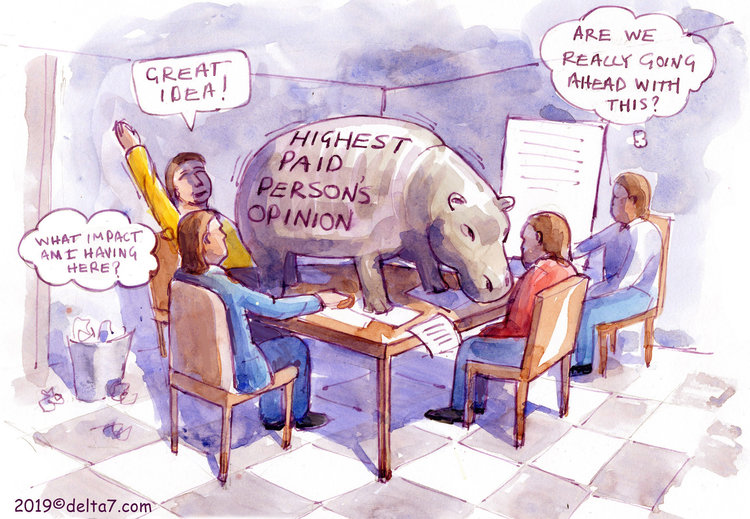 Cartoon of a hippo on a business table.