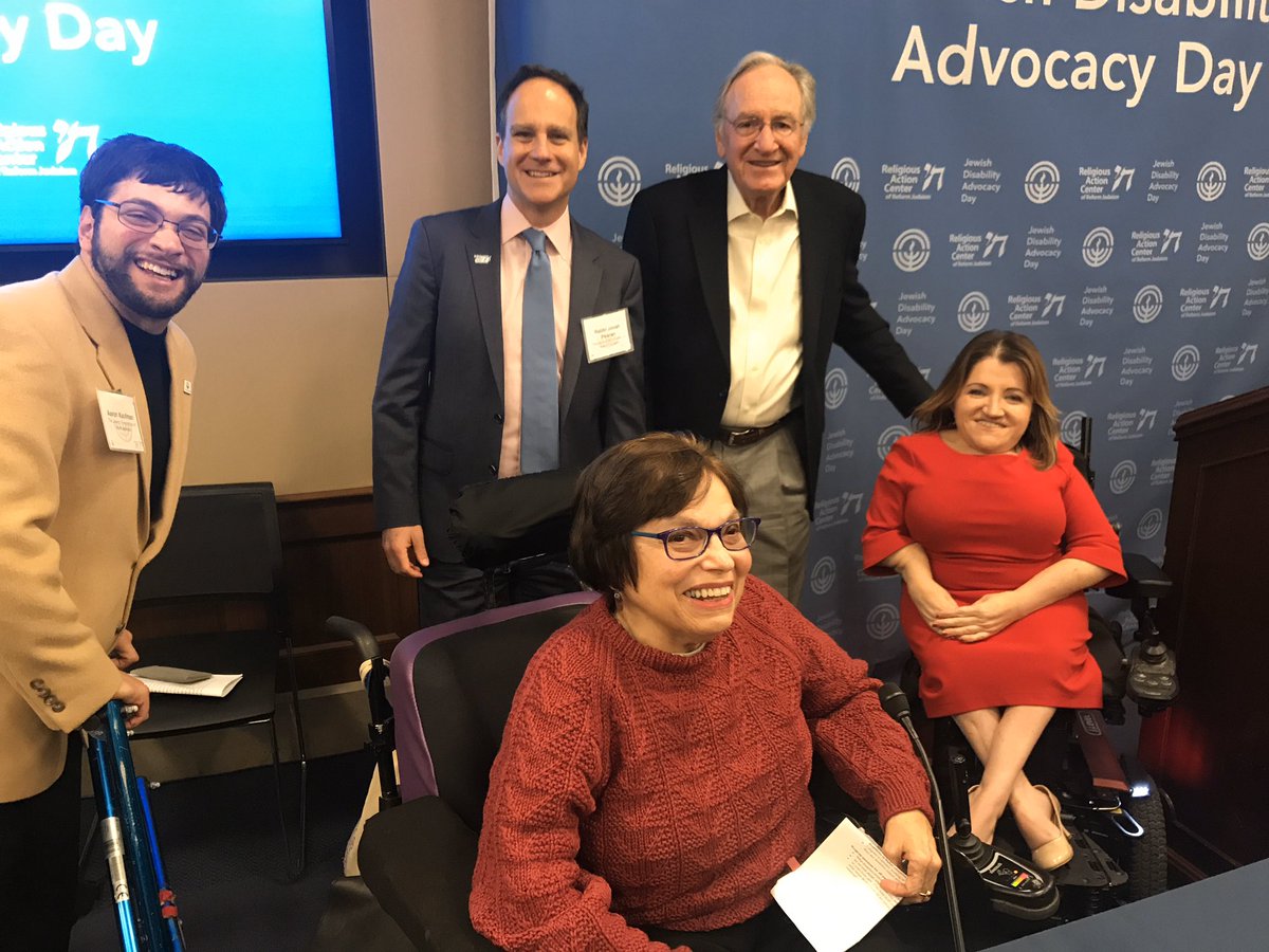 Five people pose for a photo. Back row from left: Aaron Kaufman, Rabbi Jonah Pesner and Senator Tom Harkin. Front row from left: Judith Heumann and Julie Hocker.