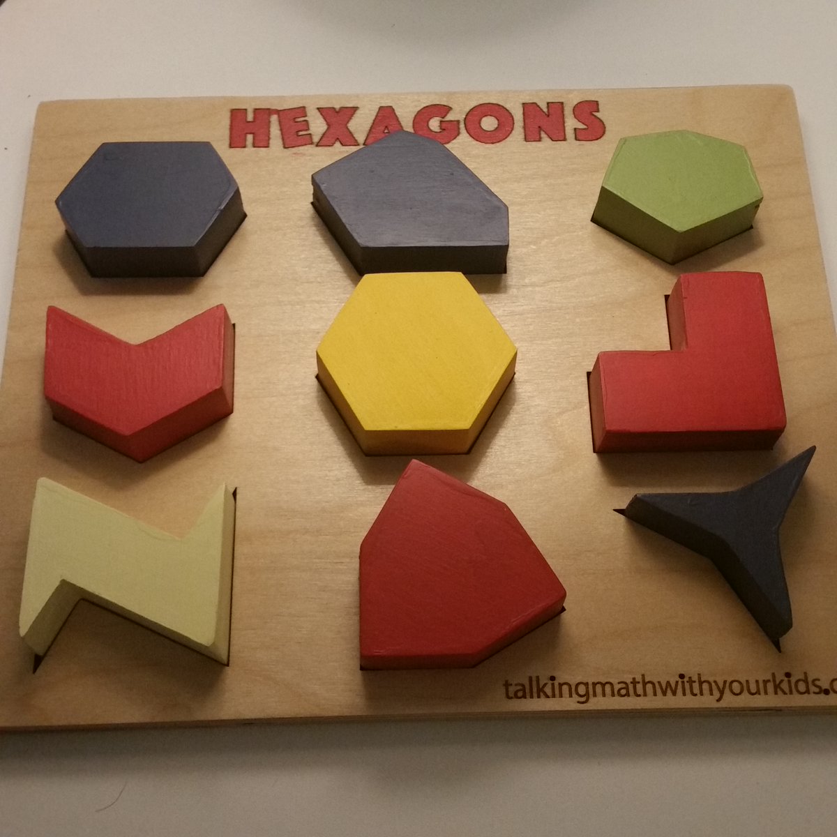 Wooden hexagons shapes puzzle.