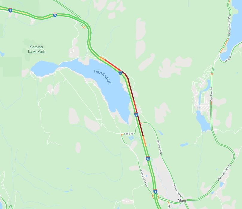 A snip of a map showing red lines indicating about 2.5 miles of traffic backed up behind a northbound I-5 work zone in southern Whatcom County. The right lane is closed, leaving just one lane for traffic to use.