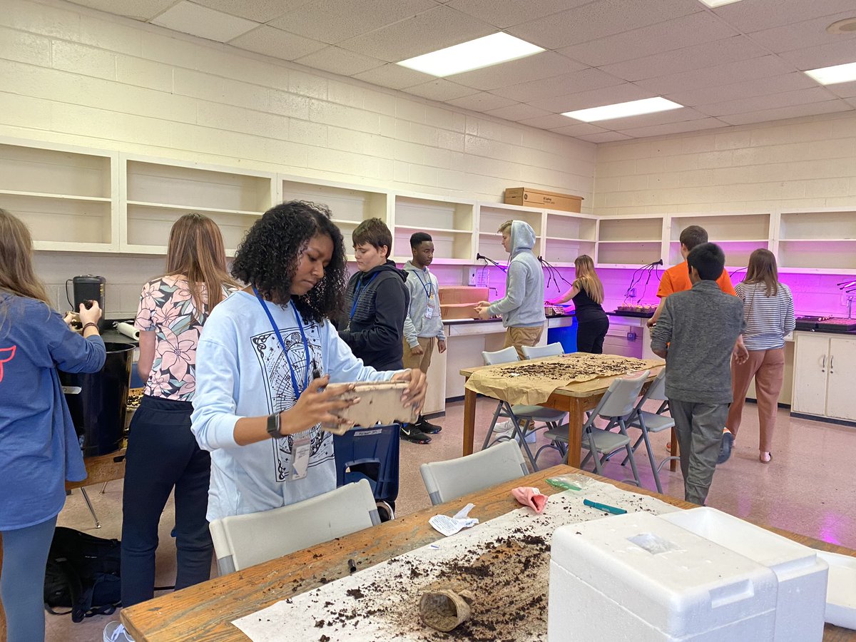EarthLms's tweet photo. Putting our learning into action by planting veggies and herbs. Small containers will get our plants ready for transfer into larger barrel gardens whenever we actually have “real Spring”! Thanks to our special guest, Master Gardner Batson! @LexingtonMiddle #ilovethisclass https://t.co/6MSKayQ6Lu
