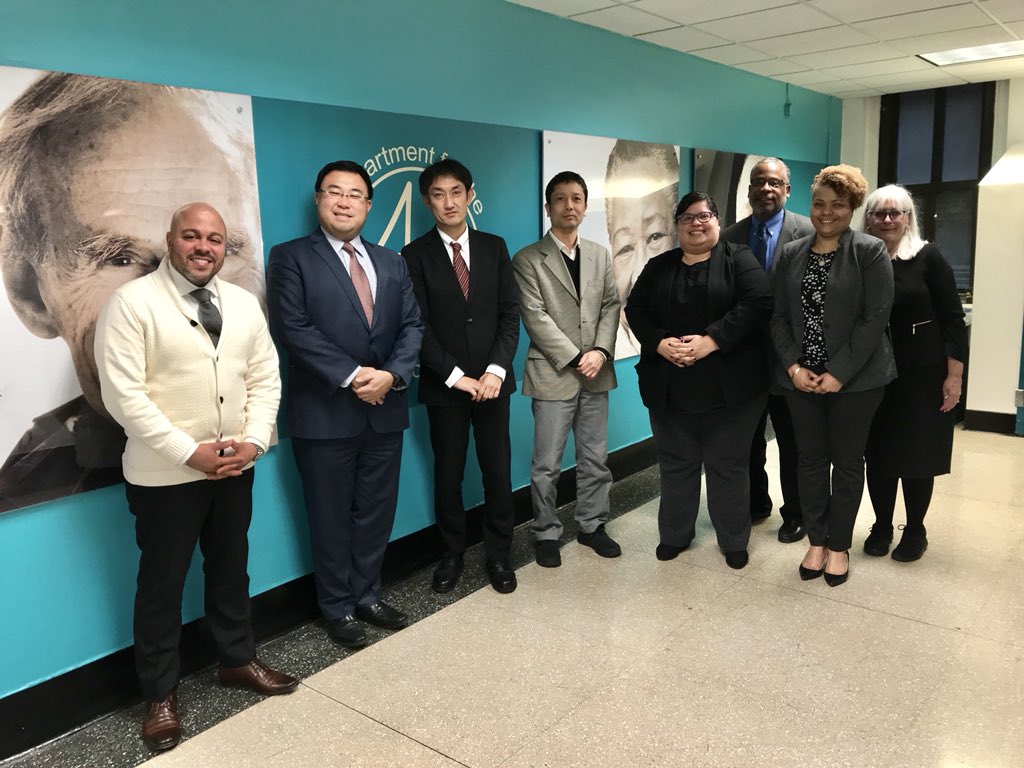 DFTA and visiting Japanese Delegation smiling together.