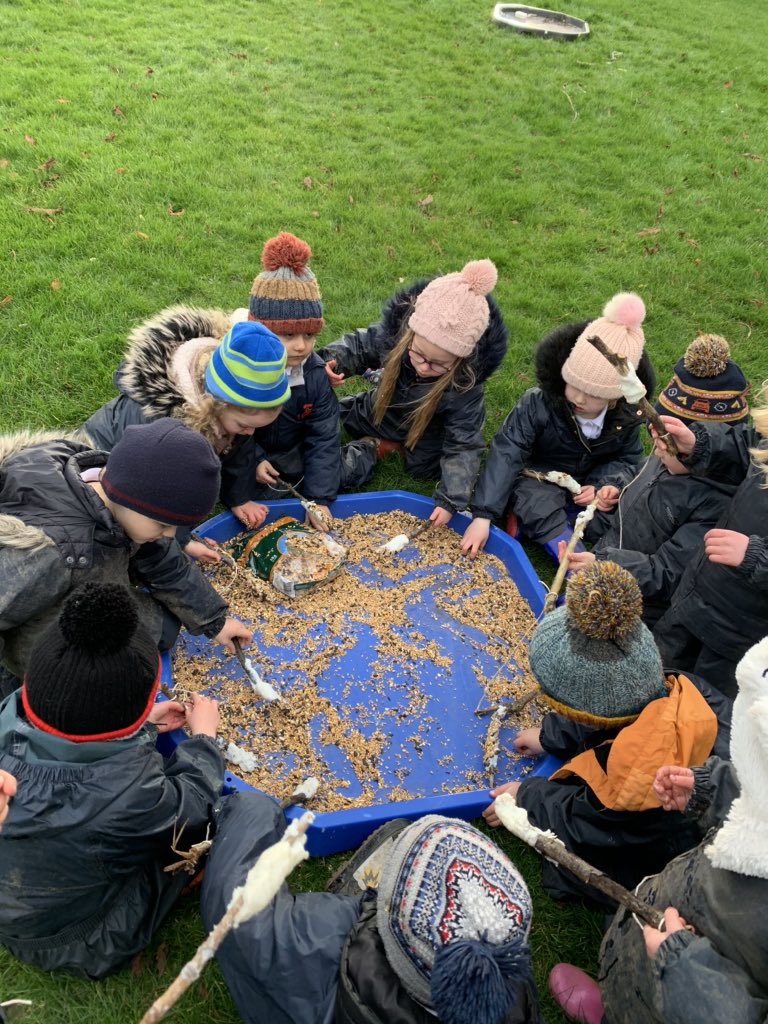 scps_foundation's tweet photo. A very chilly afternoon but that didn’t stop us getting wrapped up for week 2 of forest school. We had a great time making bird feeders with sticks, lard, honey and seeds 🌳 #springcottageFS2G #springcottageforestschool https://t.co/u6jqs8rSRS
