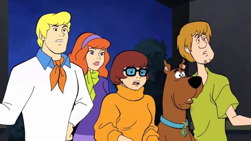 A group of meddling kids and their dog are chasing some pan flute playing M...