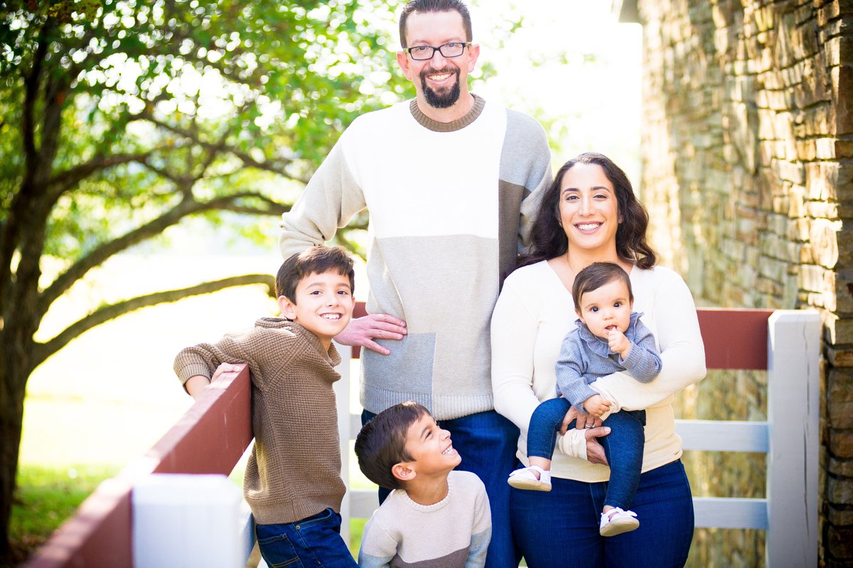 family photo of man, woman and three small children