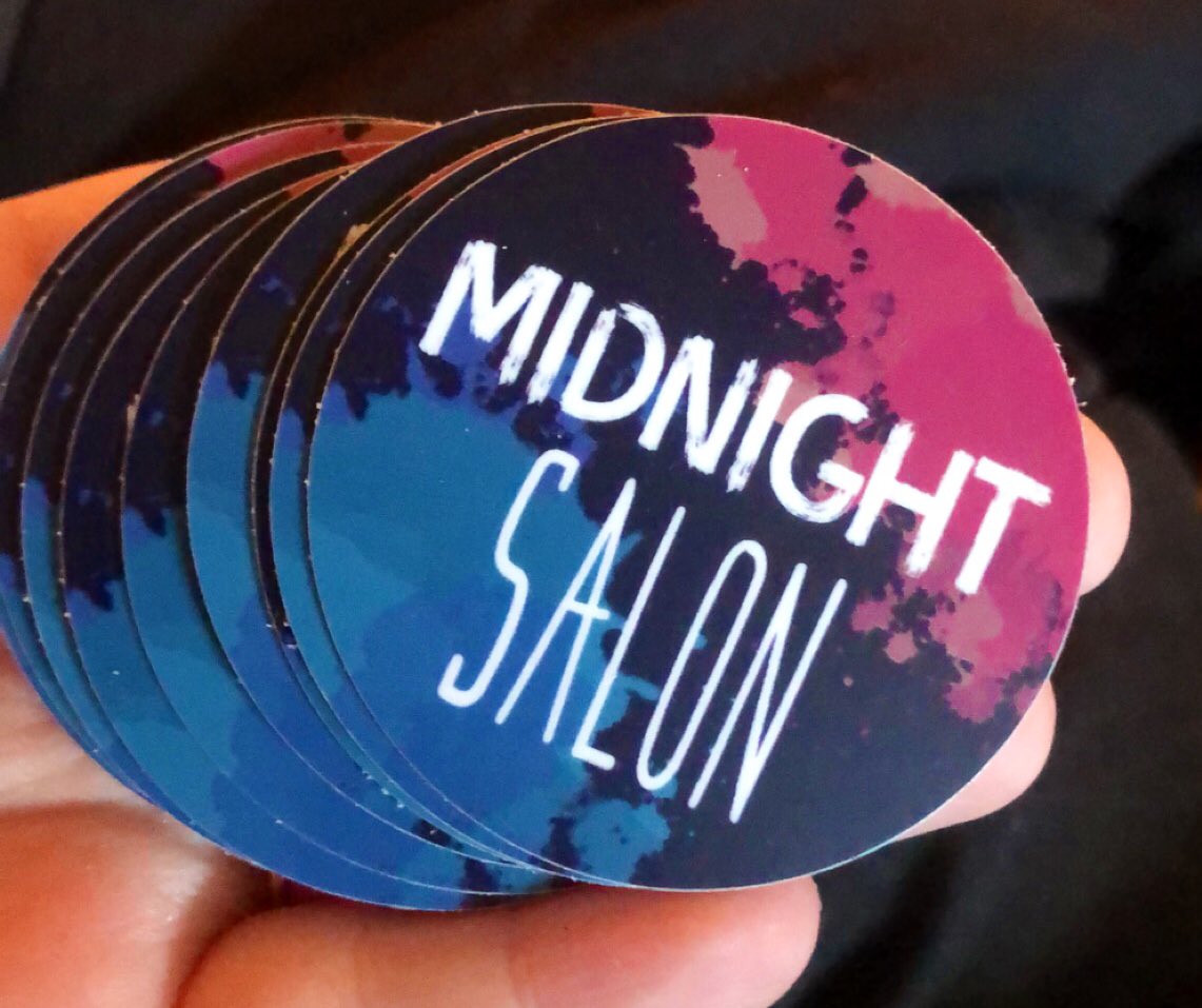 Stack of stickers with the phrase “Midnight Salon” background dye splotches.