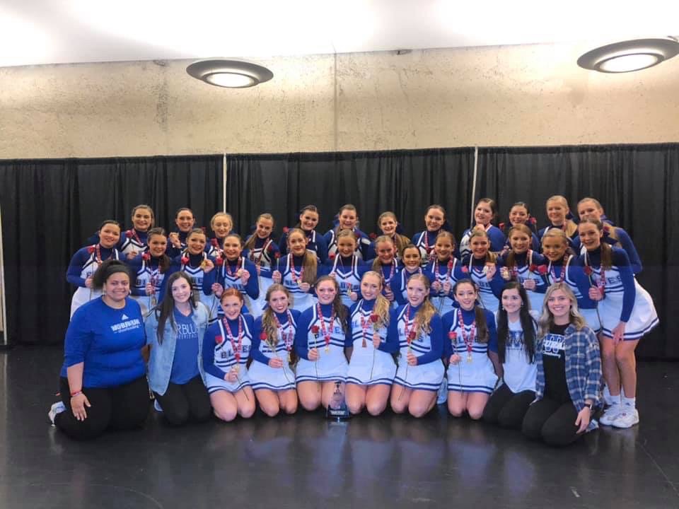 WRHSCheer's tweet photo. We are SO PROUD to have made school history this last weekend! Not only by competing for the first time ever at the national level.. but for taking home 3rd in large game performance &amp; 10th in large Varsity game day! 💙 #ruralindallas #goblues #NCAnationals https://t.co/bjec2Yen12