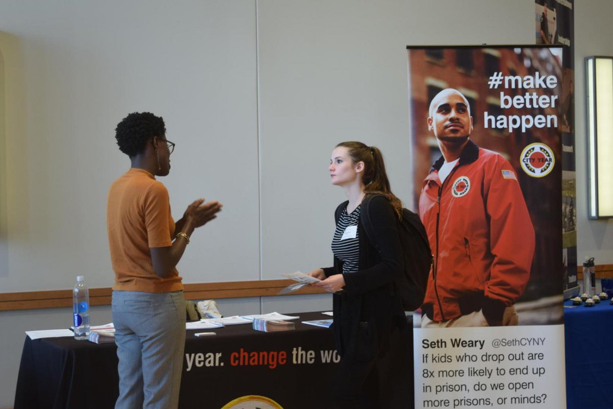 Student speaking with an employer at a job fair
