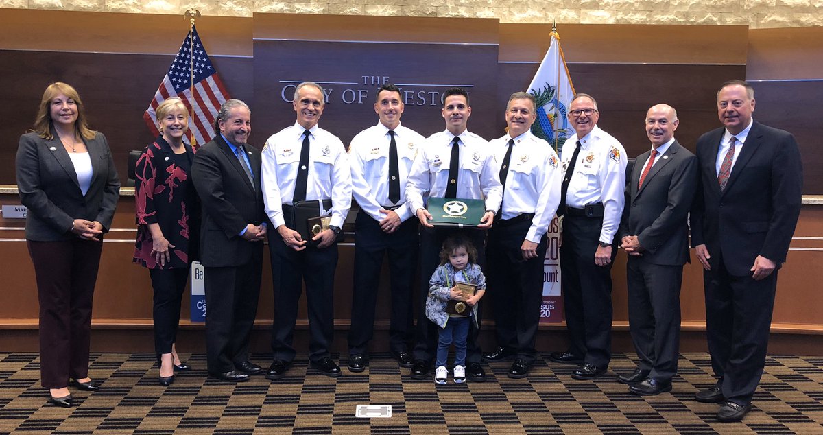 BSO Weston Fire Rescue Employees@of the Month with Weston FL City Commission and one daughter of a fire fighter holding a plague