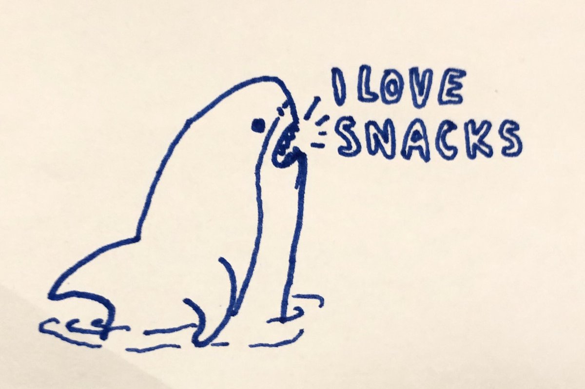 An unrealistic drawing of a shark saying, "I love snacks"