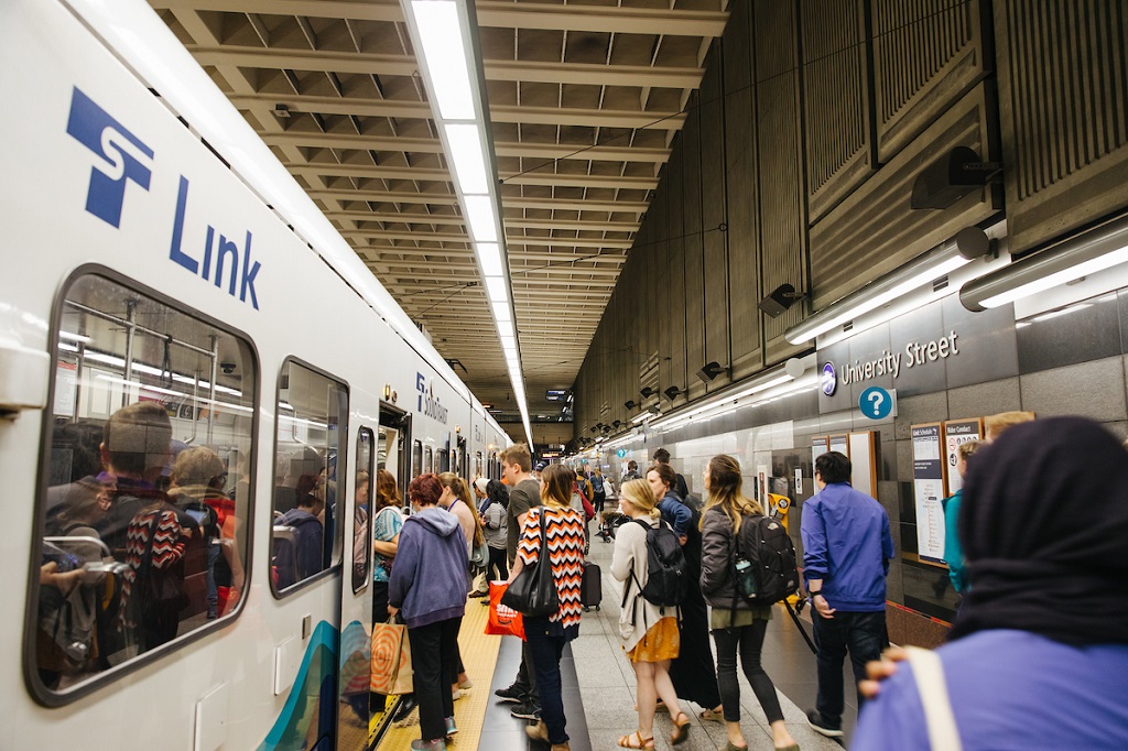 Riders board Link light rail at University Street Station.