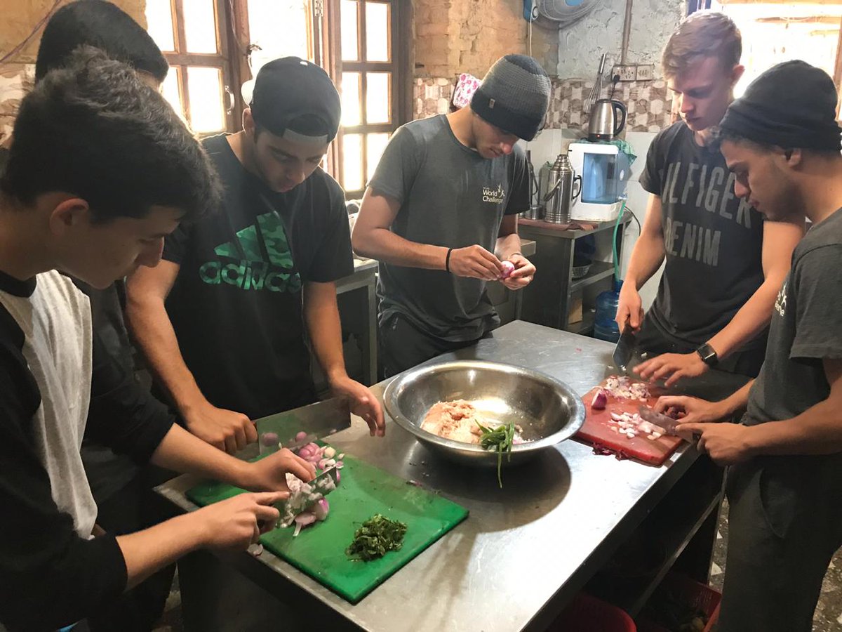 RWA_IBDP's tweet photo. The Grade 11 gentlemen getting it done in the kitchen in Nepal....new day, new skills! @RWA_IBDP #RWAcas #RWAcollaboration https://t.co/mkgGDFSih7
