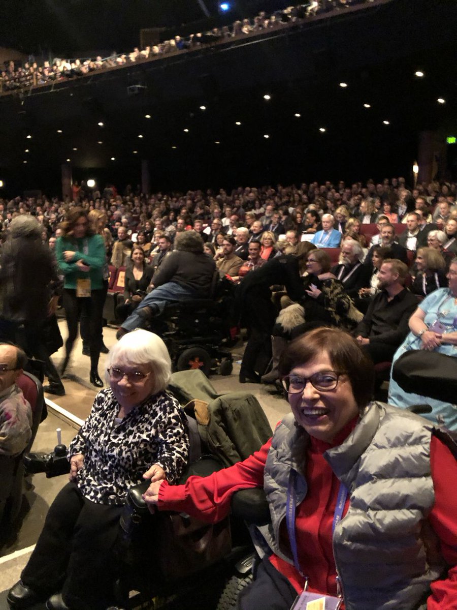 Judy and Ann Cupllo holding hands together waiting for the Crip Camp to premier