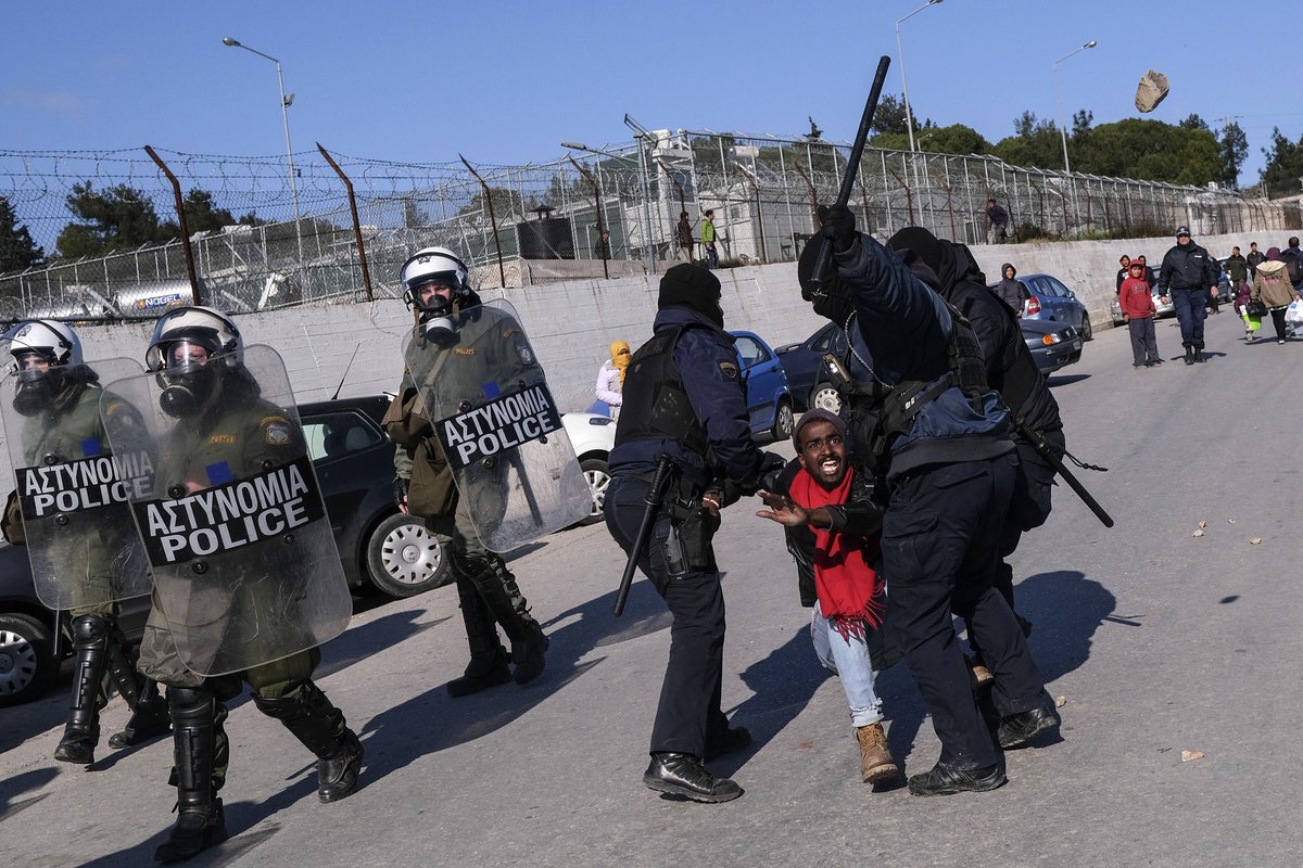 Greek Riot Police clash with an asylum seeker as #refugees and #migrants protest outside #Moria camp, following the stabbing death of an 20-year-old man from Yemen in the Greek island of #Lesbos, Friday, Jan, 17, 2020. 

Photo by: AP Photo/Aggelos Barai