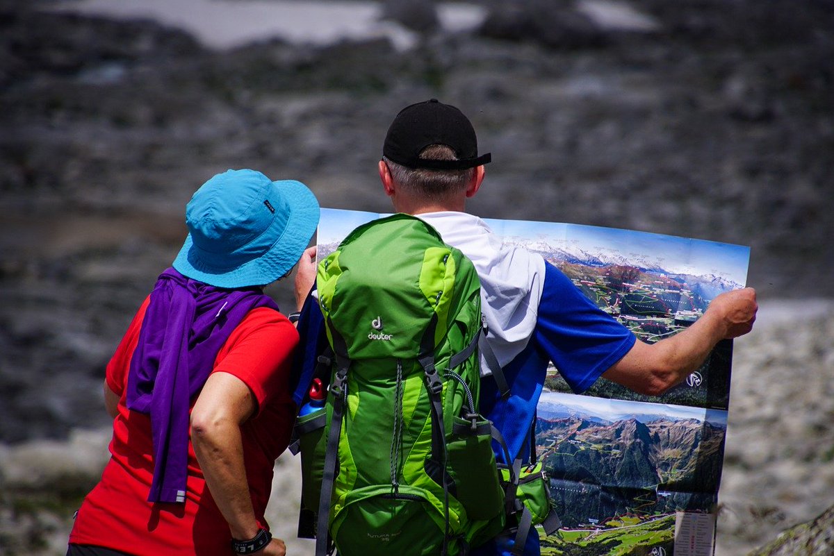 Couple in front of a map