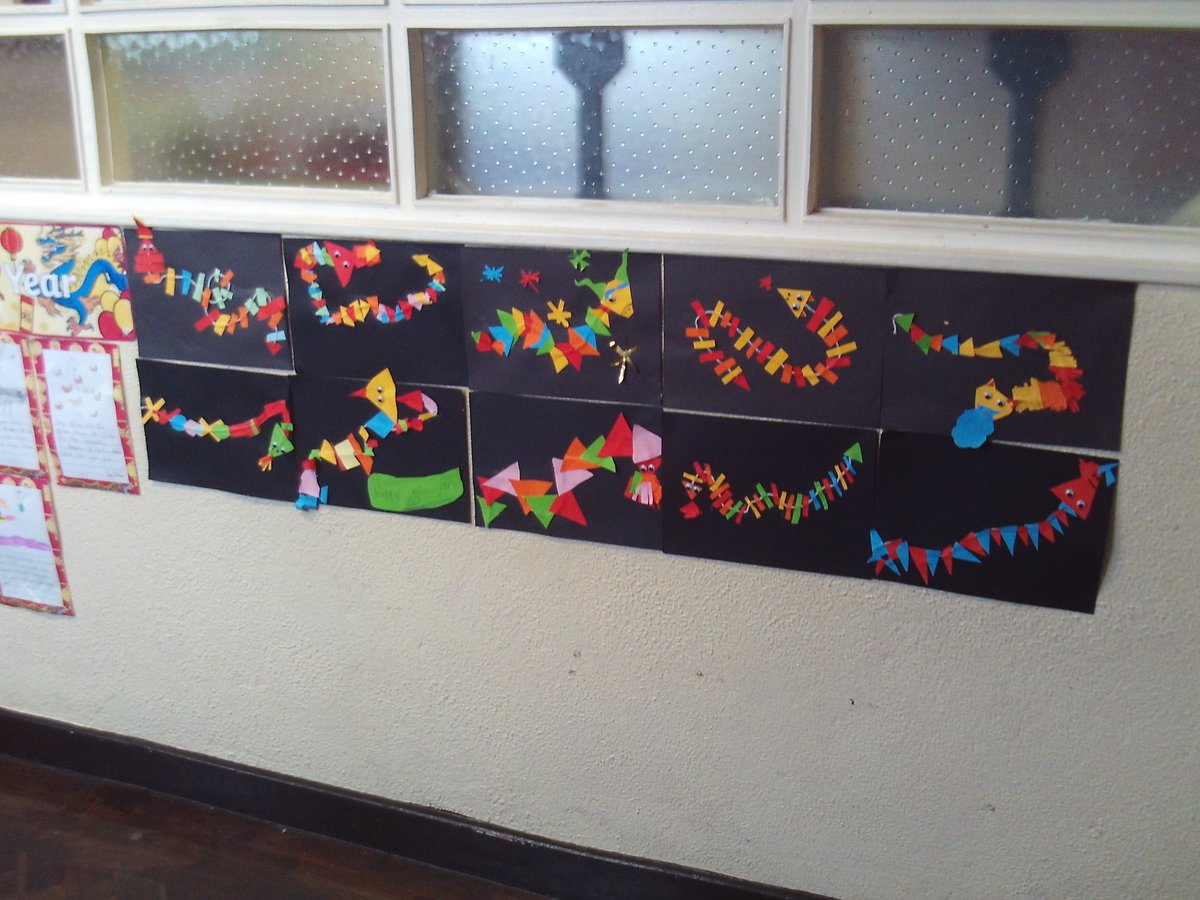3rdClassASGNS2's tweet photo. Ms. McCarron's class were learning all about the Chinese New Year this week. The girls made some colourful dragons and wrote down their favourite facts about the festival. #ChineseNewYear #YearoftheRat https://t.co/XKUgj7CsV5