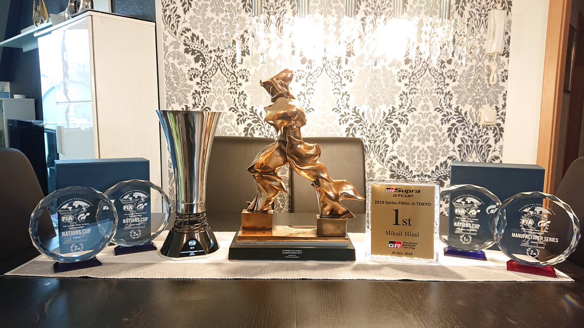 HizalMikail's tweet photo. Received my Supra Cup trophy today and finally I can take a picture with all my achievements from 2019 (even though it's a little bit too late xD).
Really looking forward to this year in terms of the Manufacturers Cup! ^^
@TeamRedlineSim @thegranturismo #GTSport #FIAGTC https://t.co/SrdAkId4Ha