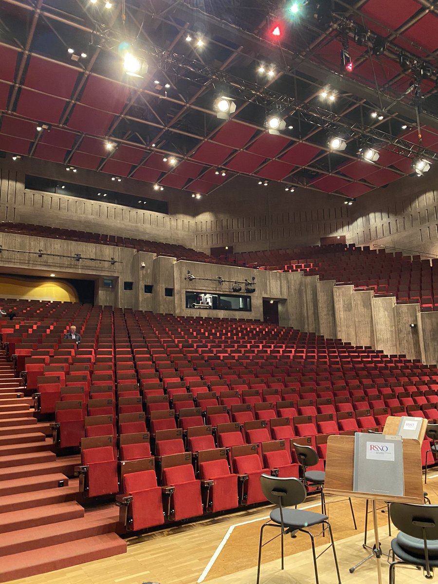 kursedtea's tweet photo. Last night’s hall in Regensburg ... I liked the austere concrete & red: reminded me of Dracula’s castle #concert5 #Europetour #rsno https://t.co/YRUvTl4ahs