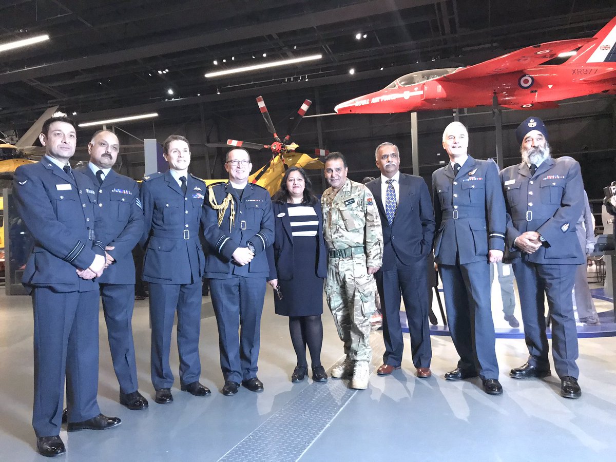 BalbirFlora's tweet photo. @RAFMUSEUM for a brilliant celebration of the unsung Indian heroes of the Second World War and their timeline since the the Royal Flying Corps, sponsored by @mackrell. Photo shows Indian Air Attaché, @RoyalAirForce and ex RAF colleague from 1999, SAC Emma Mistry working at Hendon https://t.co/dK7C9QhVNg