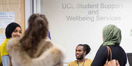 Staff and students at the UCL Student Support and Wellbeing Service helpdesk