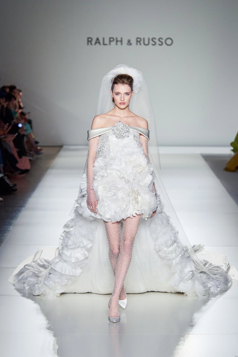 It's not a terribly traditional dress, no, but after what happened to poor dear old Vernon, one simply couldn't have another traditional wedding. And yet one must move on. Isn't that right, Dimitri darling? Yes, one MUST move on. (ralph & russo)