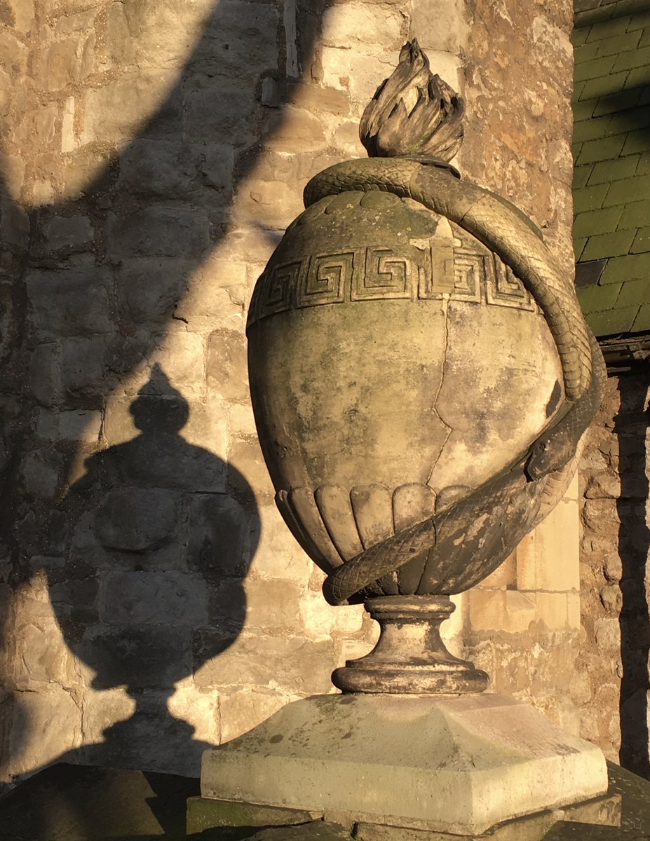 GeoffreyMunn1's tweet photo. The flame of love encircled by the uroboros, the snake biting its tail, emblem of eternity and eternal life. This is Sealy tomb erected in 1808 at St. Mary at Lambeth. It is not stone but a ceramic called #codestone. https://t.co/eO9YfzJQQR
