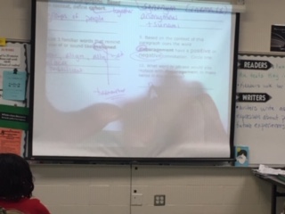 Trans=across, port=carry-  Mrs. Catt "transports" students over the bridge of understanding by breaking down words and modeling how roots work in her classroom.  Consistent practice helps to build strong readers. <a href="/Hamilton_WMS/">Wilson Middle School</a> #BigBlueOnTheMove