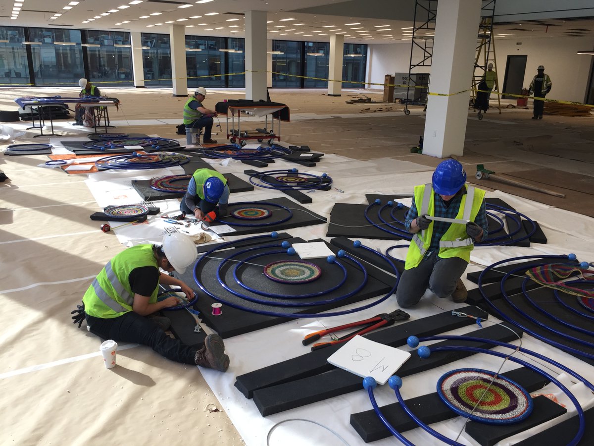 dcpl's tweet photo. Art brings #MLKFuture to life! Artist Xenobia Bailey & the Cross Museum Services team have installed the original art in the Library's Grand Reading Room. Bailey's hanging sculpture is inspired by the contemporary African American homemaker, protest art & movement of the cosmos. https://t.co/xjGUROLwvK