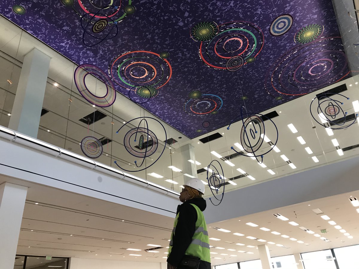dcpl's tweet photo. Art brings #MLKFuture to life! Artist Xenobia Bailey & the Cross Museum Services team have installed the original art in the Library's Grand Reading Room. Bailey's hanging sculpture is inspired by the contemporary African American homemaker, protest art & movement of the cosmos. https://t.co/xjGUROLwvK