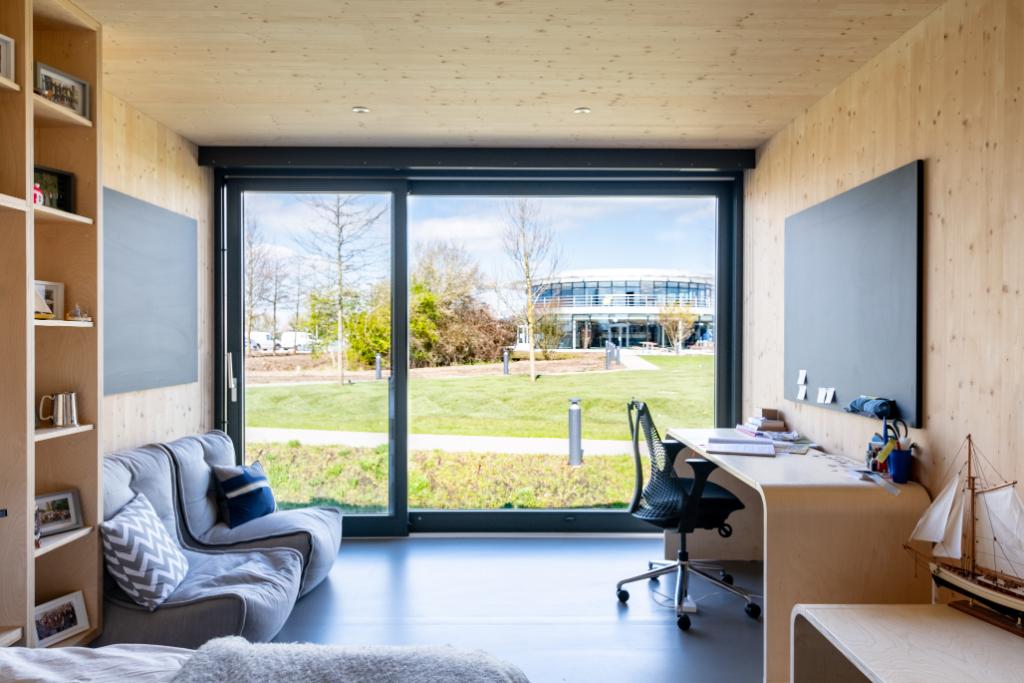 Dyson's tweet photo. Dyson Village is an innovative new typology for high quality student accommodation and provides a place of education, sport and a home for our Undergraduate Engineers. #dyson #insidedyson #dysoninstitute https://t.co/Z8zRUHMZYI