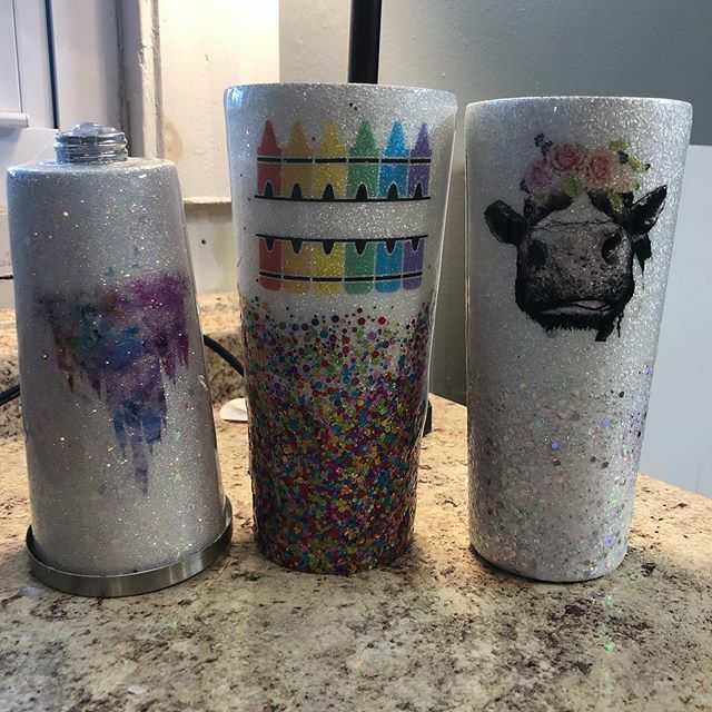 SHullDesigns's tweet photo. These just got their decals! Teacher one and castle storyboard are up for grabs. The adorable cow has a home already! #shdesignsboutique #custom #handmade #glittertumblers #teachergifts https://t.co/jNxQZAoaBb https://t.co/QzkcyUIuqB