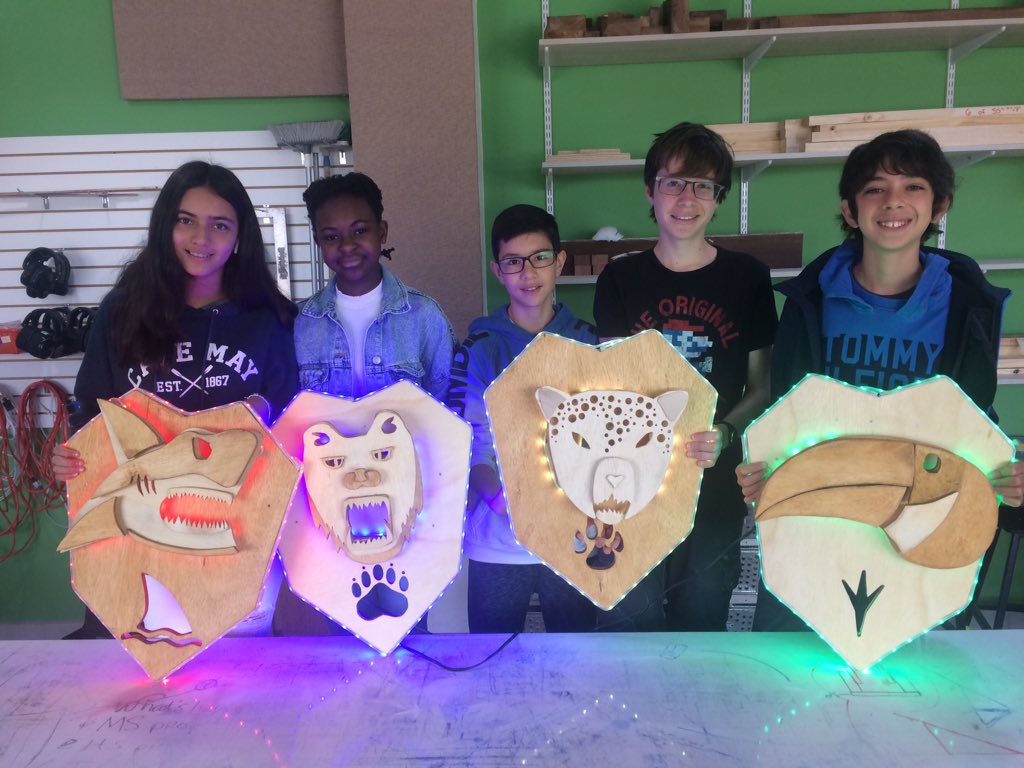 EnglehartJordan's tweet photo. I’m so proud of these kids and the project they have developed!  Our school is divided into 4 Houses (Sharks, Bears, Jaguars, Toucans) and this group has made a set of House masks to hang in the middle school to help promote team spirit!  Amazing work!  #ACmakerspace @acotopaxi https://t.co/w09nV2RKzu