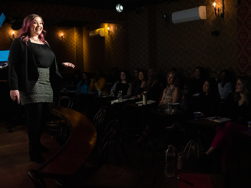 PodcastRow's tweet photo. Brooke Allison, founder of Brooke Allison Coaching, speaking to Podcast Row attendees about how to create a story that is fiercely unstoppable.

#brookeallison #coaching #theglow #fiercelyunstoppable #podcastrow https://t.co/lnhj5Tyq8z