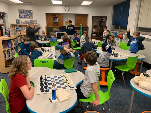 Roosevelt's Chess Club participants learning the intricacies of the game.  <a href="/tosaschools/">Wauwatosa Schools</a>