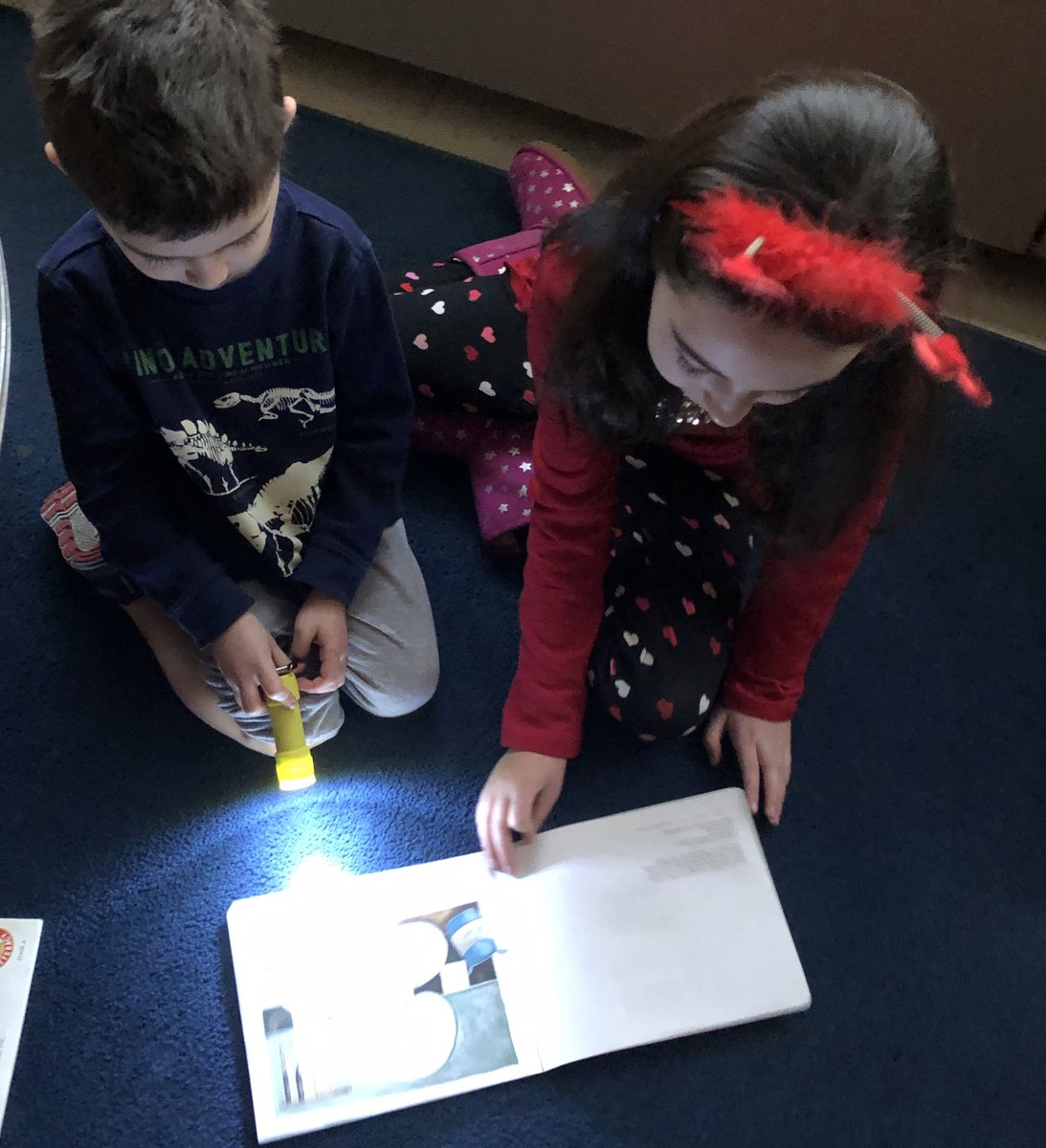 Mrs___Reid's tweet photo. “Reading should not be presented to children as a chore, a duty. It should be offered as a gift.” ~ Kate DiCamillo 📚 

Thank you to @hubbardteacher ‘s third graders for sharing the joy of reading with us! 🔦 We love Flashlight Friday!! @Hubbard_School https://t.co/QrWSLtlqX7