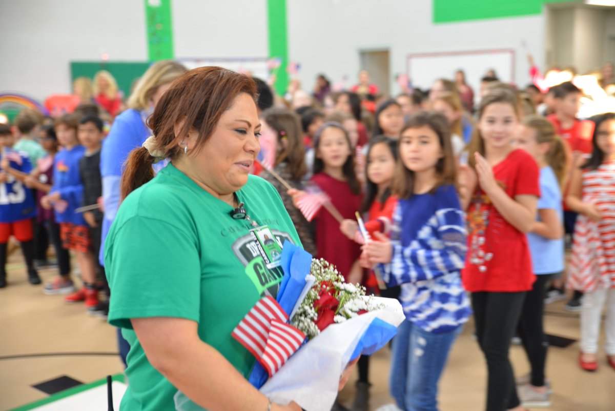 Carrollisd's tweet photo. It was an amazing morning at @CESSouthlake. The students and staff threw a surprise celebration for one of their staff members, Jenny Lopez, who recently completed all the requirements to earn her U.S citizenship! Congrats, Ms. Jenny, we are so excited for you! #WeAreDragons https://t.co/WXJdMMdxq3