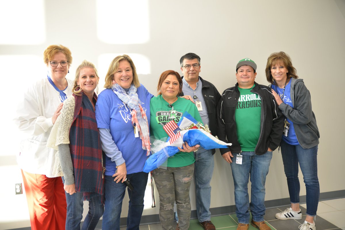 Carrollisd's tweet photo. It was an amazing morning at @CESSouthlake. The students and staff threw a surprise celebration for one of their staff members, Jenny Lopez, who recently completed all the requirements to earn her U.S citizenship! Congrats, Ms. Jenny, we are so excited for you! #WeAreDragons https://t.co/WXJdMMdxq3