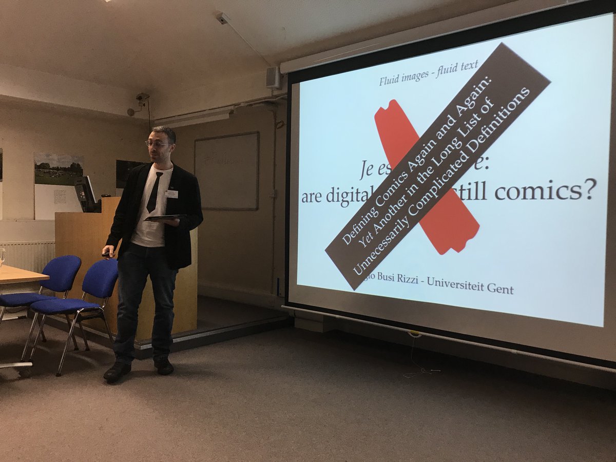 Giorgio Busi Rizzi asking whether digital comics are still comics, at Cardiff comics conference #FluidImages