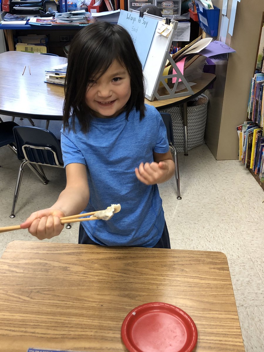MrsKardos's tweet photo. We celebrated Chinese New Year with a story, dumplings, and dragonfruit. We even practiced using chopsticks! We loved learning about another culture! We were so lucky to have a parent come in and share. @TimberLaneES https://t.co/nJDcu7wEgT