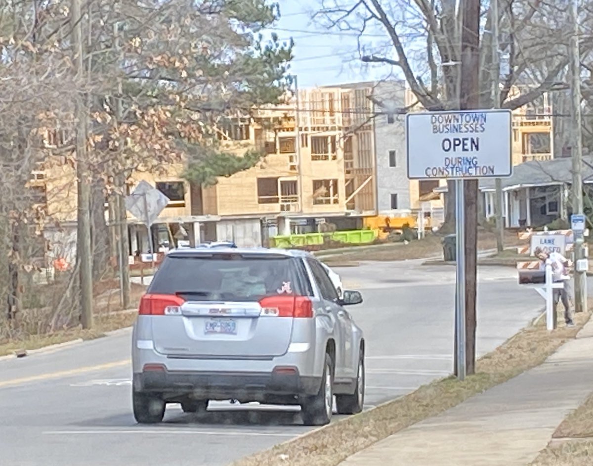 CaryByDesign's tweet image. Vertical edges like Chatham Walk act as a traffic-calming design element on the commuter cut-through corridor that E. Chatham Street is in downtown #CaryNC by extending the downtown look and feel.   #25MPH