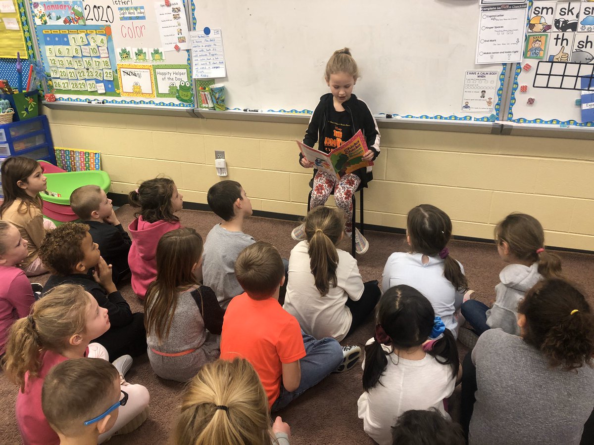 teach1reed's tweet photo. I had a guest reader in my room today! My class loved hearing her read โค๏ธ #pbis #buzzbucks @MrBiedenbach @TRLSDjackets https://t.co/94uICBKgd9